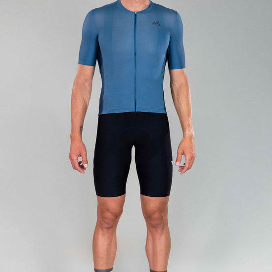 full body frontal view of man wearing eldhraun classic cycling jersey