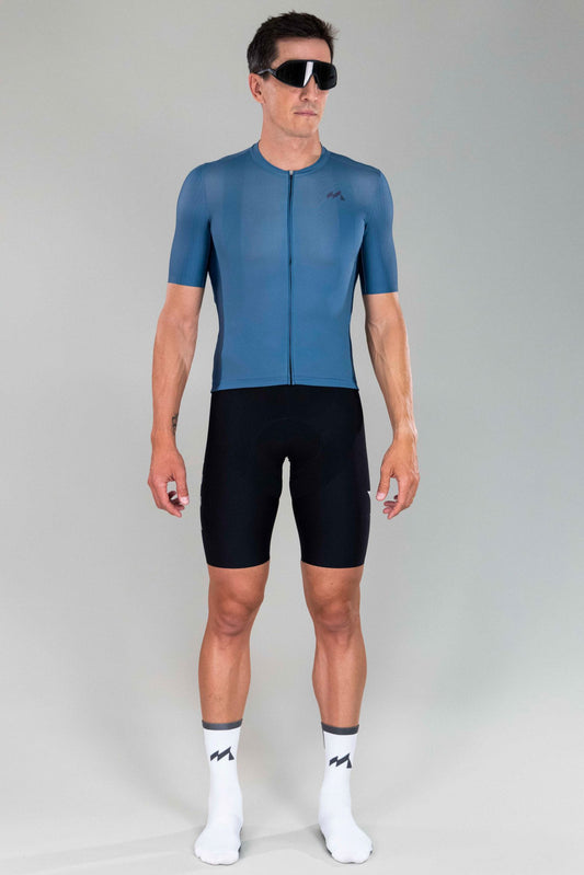 full body frontal view of man wearing eldhraun classic cycling jersey