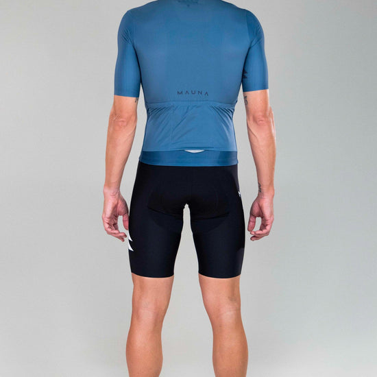 full body back view of man wearing eldhraun classic cycling jersey