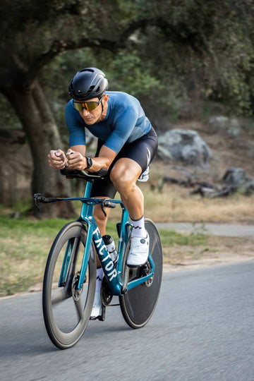 man cycling in mauna's eldhraun classic cycling jersey