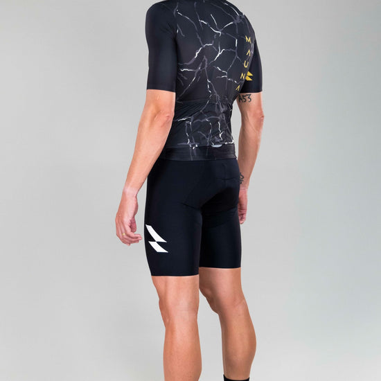 back left-side view of man wearing Eldhraun force cycling jersey in black